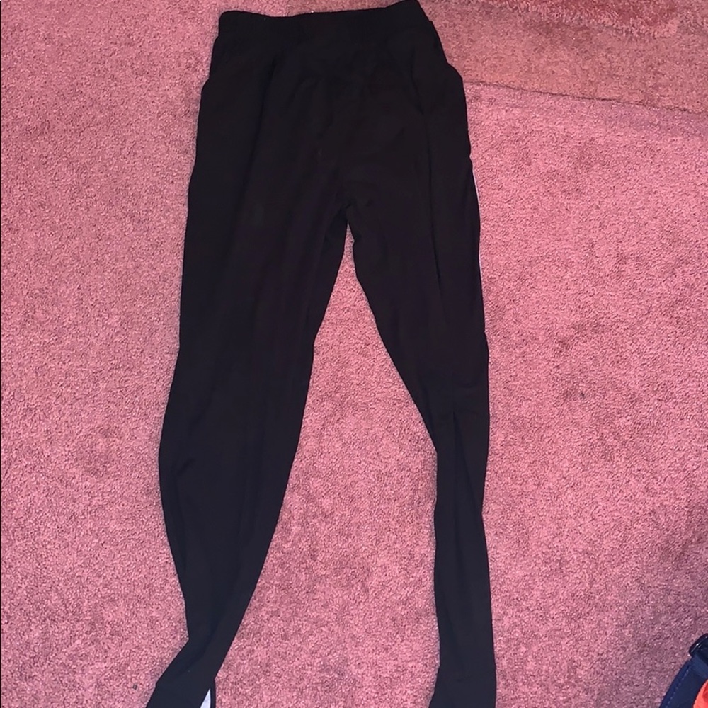 black joggers with white stripes